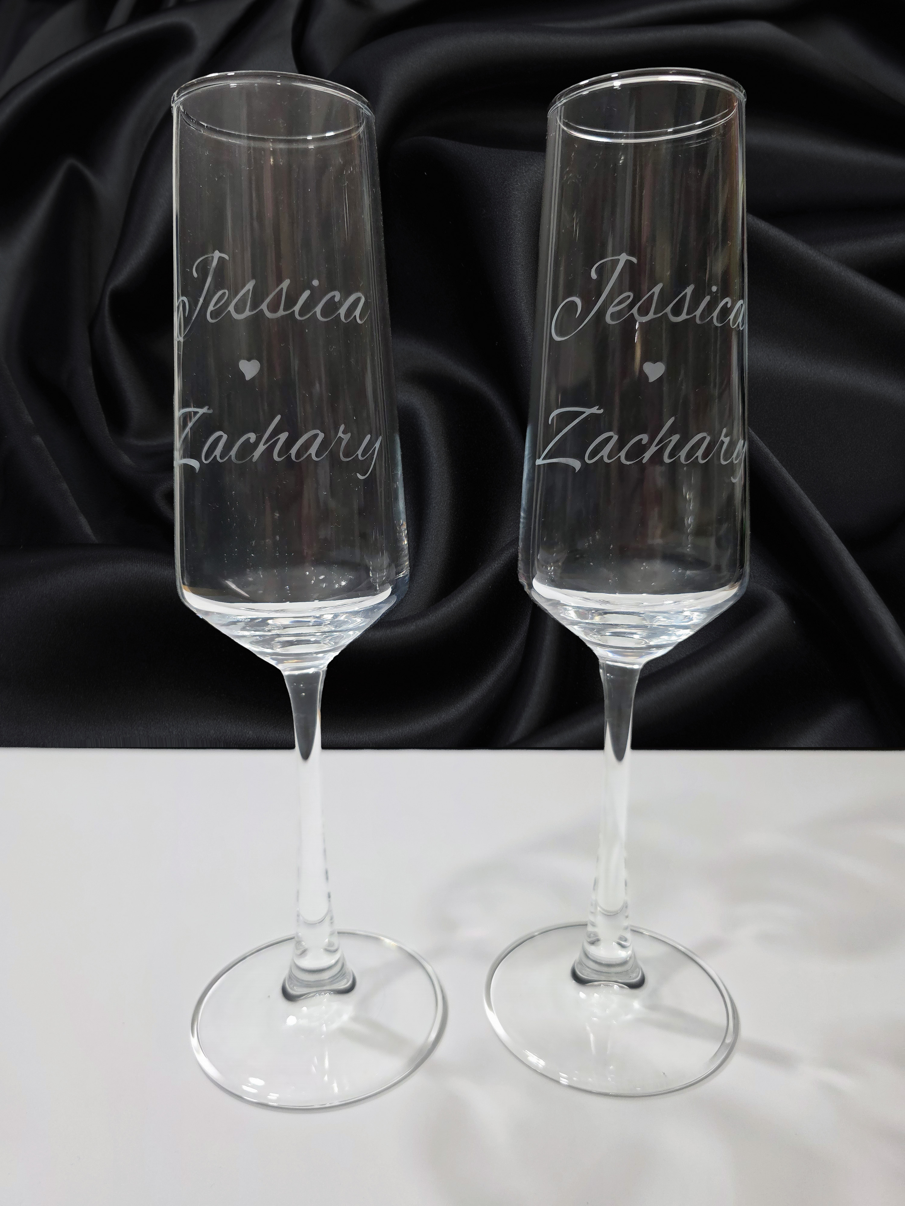 Hand etched champagne flutes by Tallon and Rose